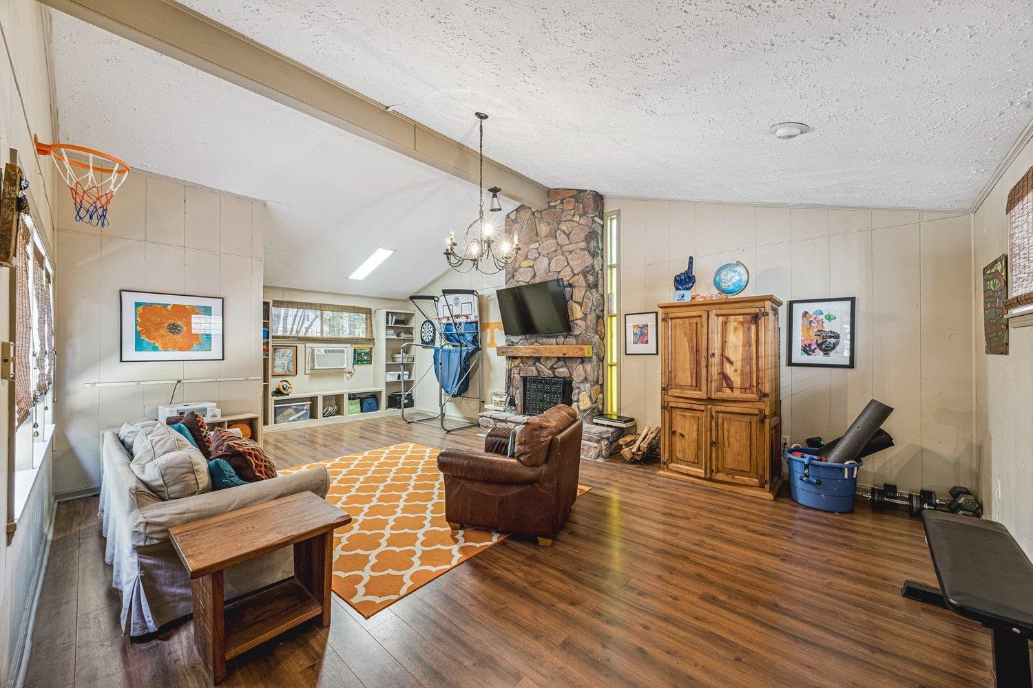 4220 Minden Road Memphis, TN 38117 - Photo 22 of 30 a living room with furniture flat screen tv and wooden floor