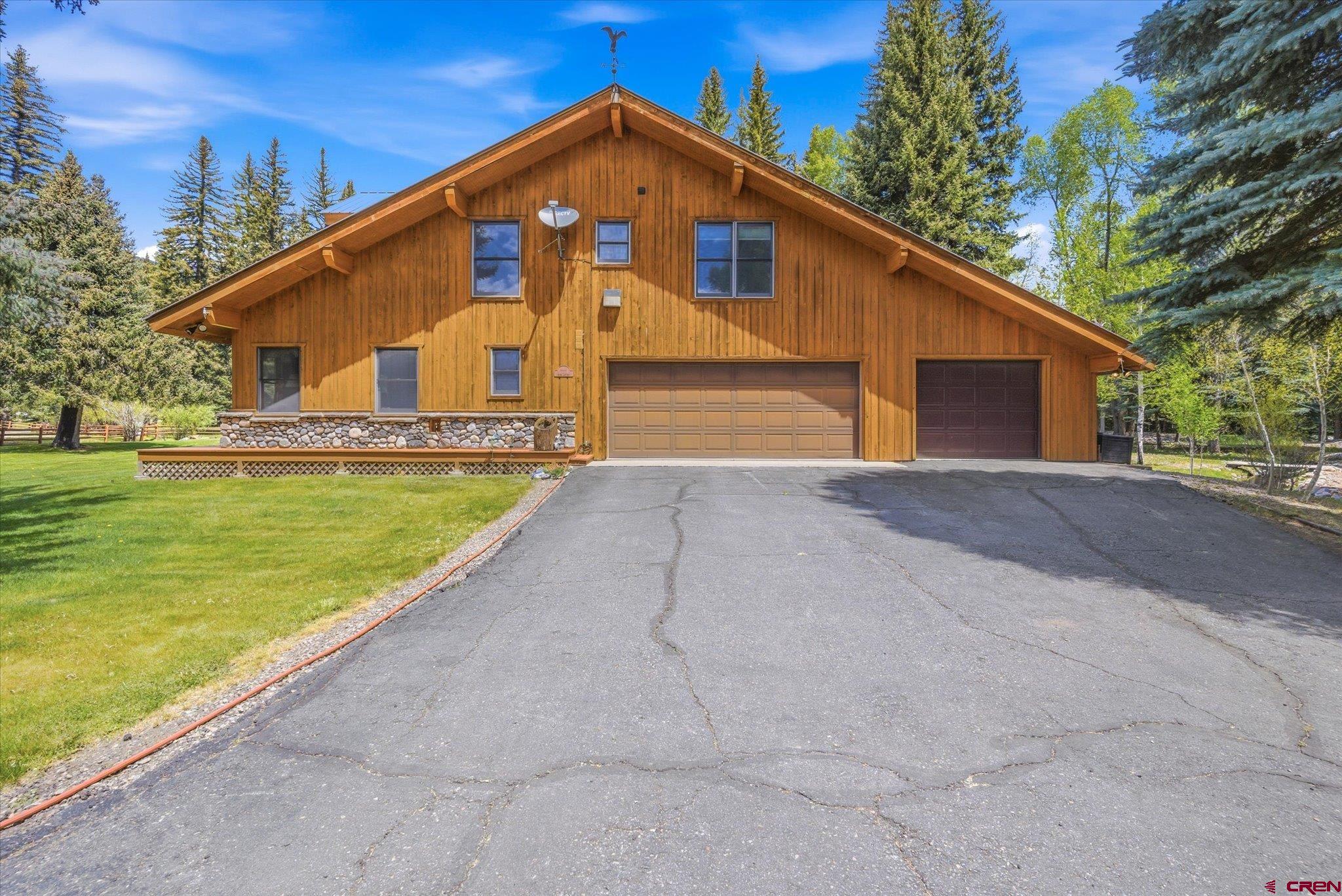 197 Hummingbird Way Bayfield, CO 81122 - Photo 4 of 44 a view of a house with backyard and garden