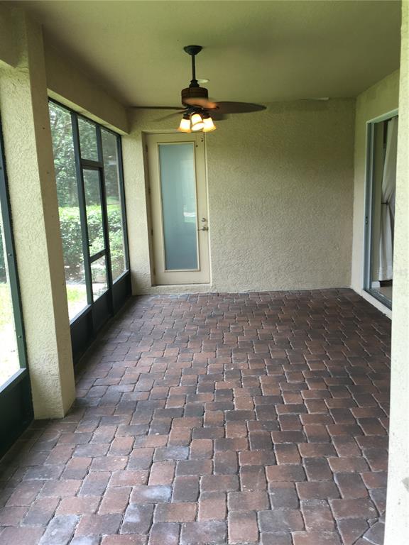 18047 Java Isle Drive Tampa, FL 33647 - Photo 12 of 21 a view of a hallway with windows