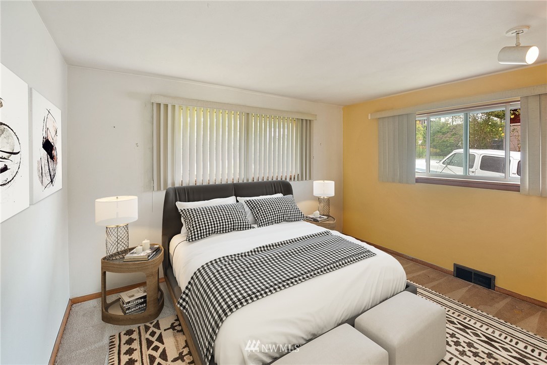 7724 South Sunnycrest Road Seattle, WA 98178 - Photo 14 of 21 a bedroom with a bed and a window