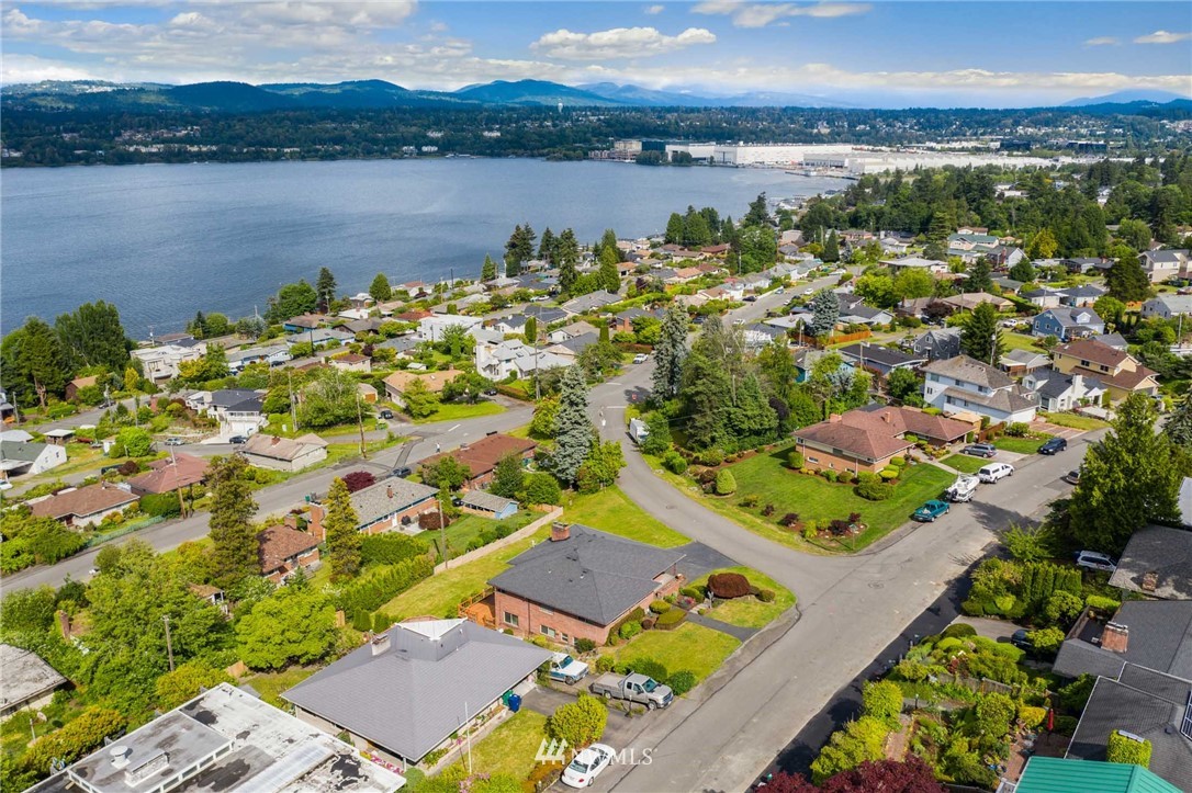 7724 South Sunnycrest Road Seattle, WA 98178 - Photo 21 of 21 an aerial view of a house with a lake view