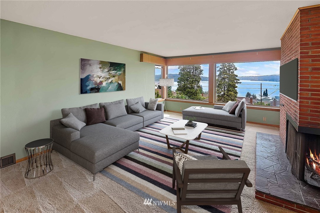 7724 South Sunnycrest Road Seattle, WA 98178 - Photo 6 of 21 a living room with furniture and a floor to ceiling window