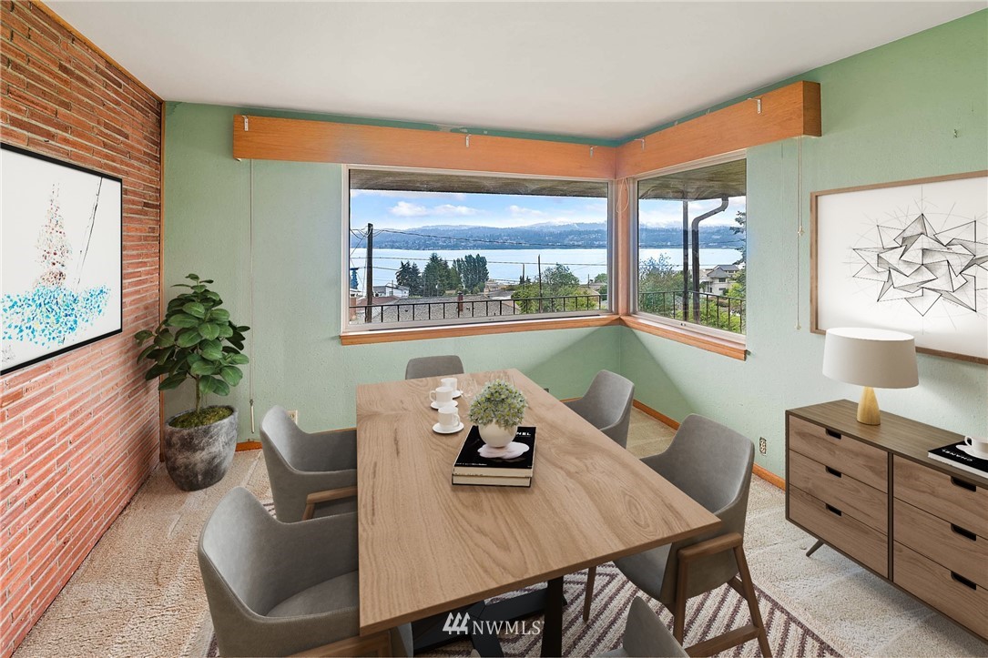 7724 South Sunnycrest Road Seattle, WA 98178 - Photo 8 of 21 a view of a dining room with furniture window and outside view