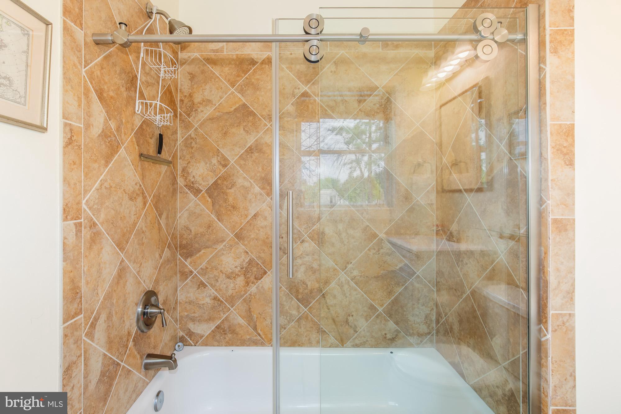 116 V Street Northeast Washington, DC 20002 - Photo 13 of 26 a bathroom with a shower