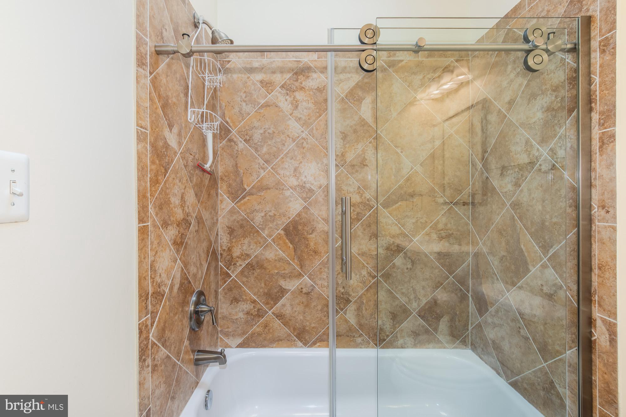 116 V Street Northeast Washington, DC 20002 - Photo 17 of 26 a bathroom with a shower