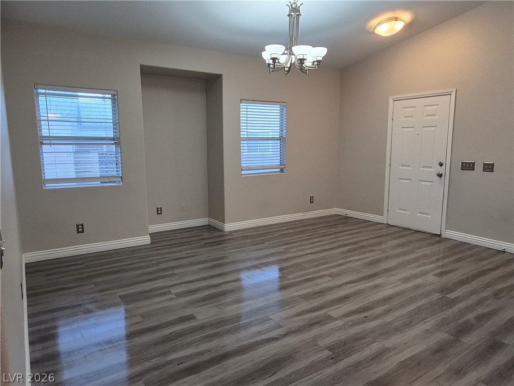 2053 Quarry Ridge Street, Unit 201 Las Vegas, NV 89117 - Photo 12 of 21 A well-lit room featuring durable flooring and an inviting entrance.