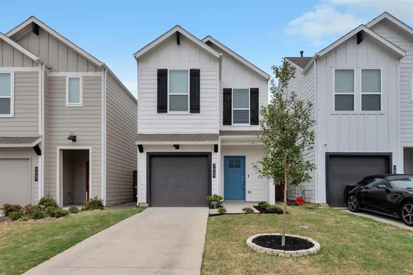 a house view with a garden space