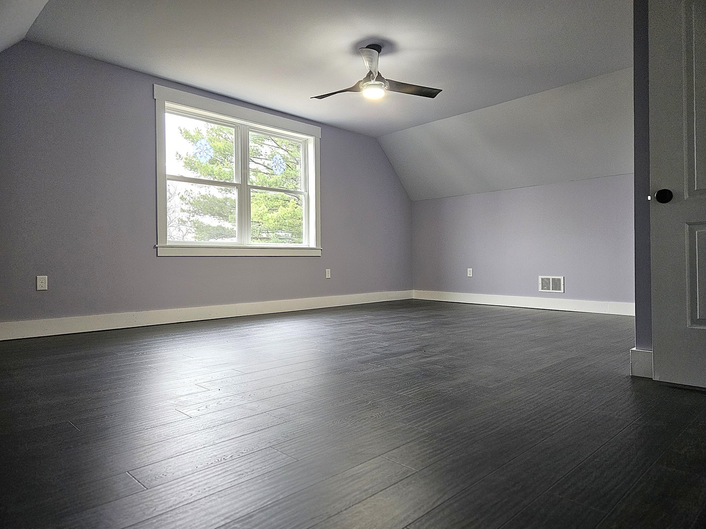 809 McCoy Road Amboy, IL 61310 - Photo 25 of 58 an empty room with wooden floor and windows