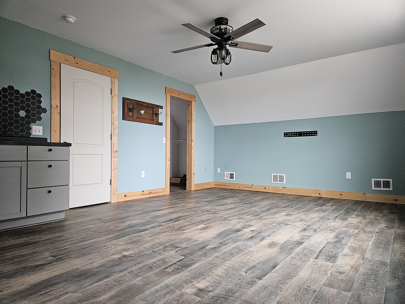 809 McCoy Road Amboy, IL 61310 - Photo 30 of 58 a view of an empty room with window and wooden floor