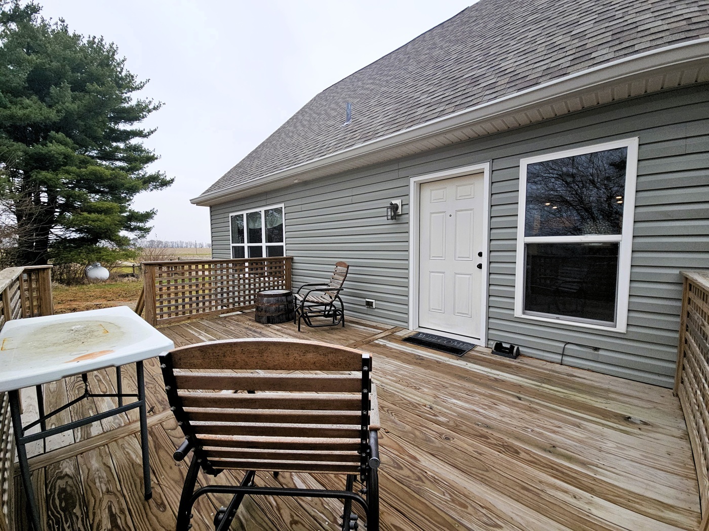 809 McCoy Road Amboy, IL 61310 - Photo 48 of 58 a view of a patio with a table and chairs