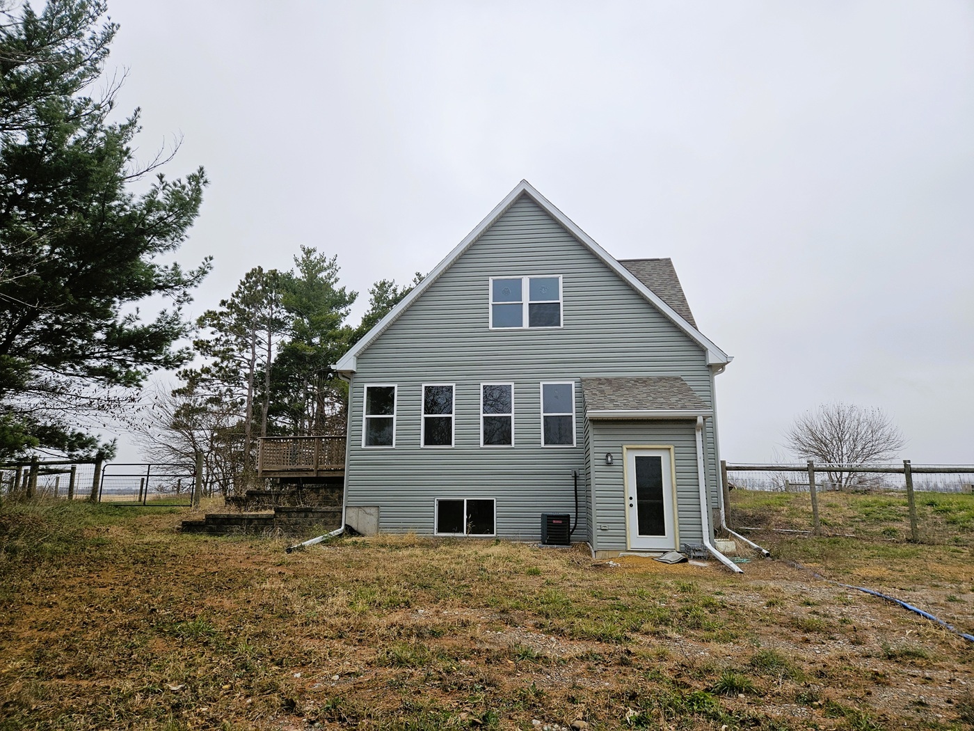809 McCoy Road Amboy, IL 61310 - Photo 55 of 58 a house that has a tree in front of it