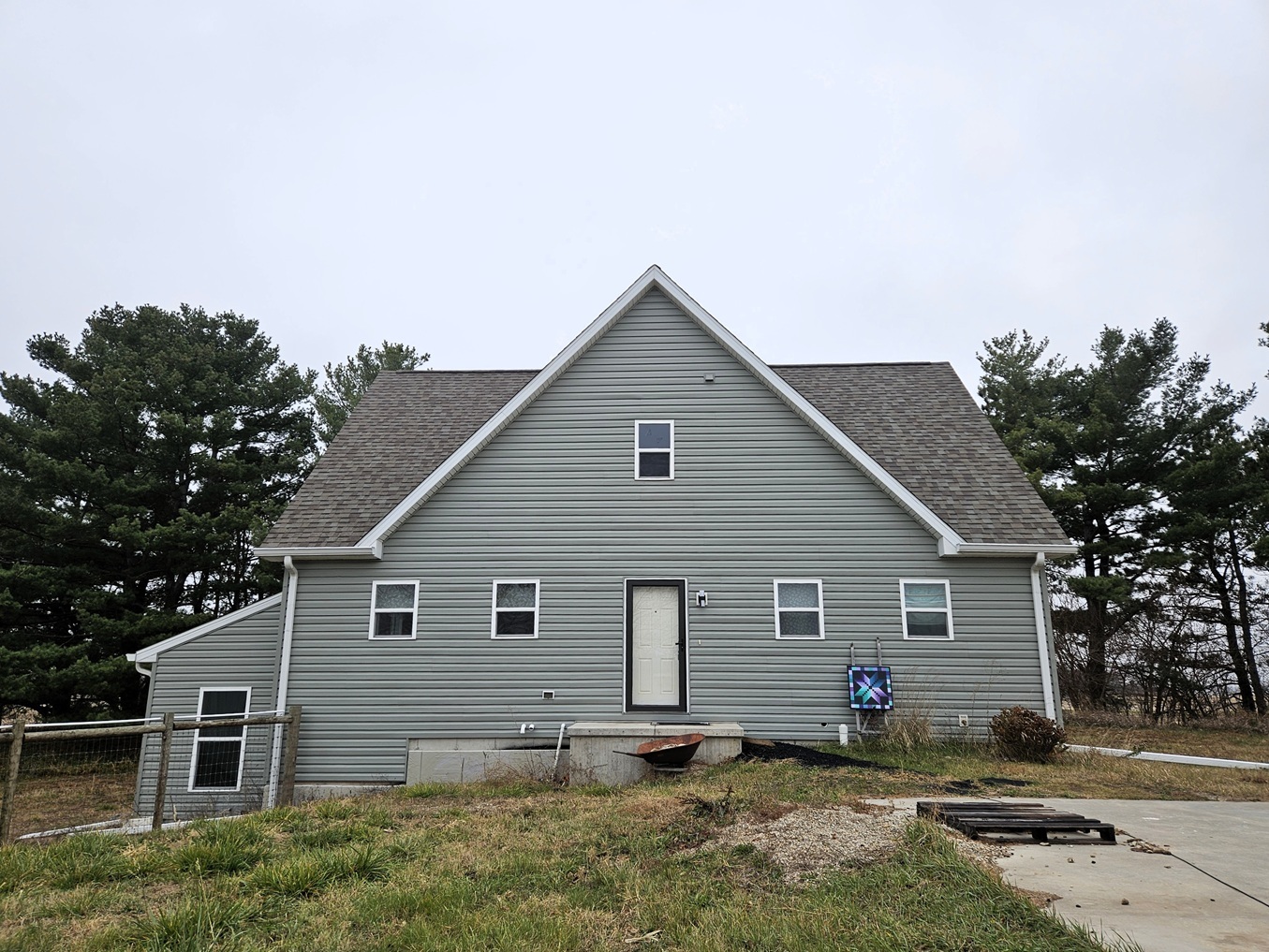 809 McCoy Road Amboy, IL 61310 - Photo 57 of 58 a view of a backyard with plants and large tree