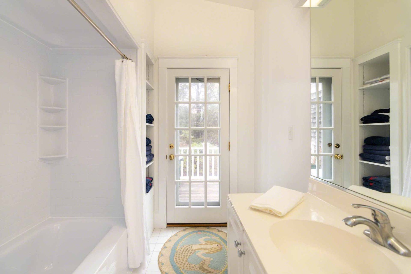 22 Edgartown Bay Road Edgartown, MA 02539 - Photo 26 of 55 a bathroom with a tub sink and mirror