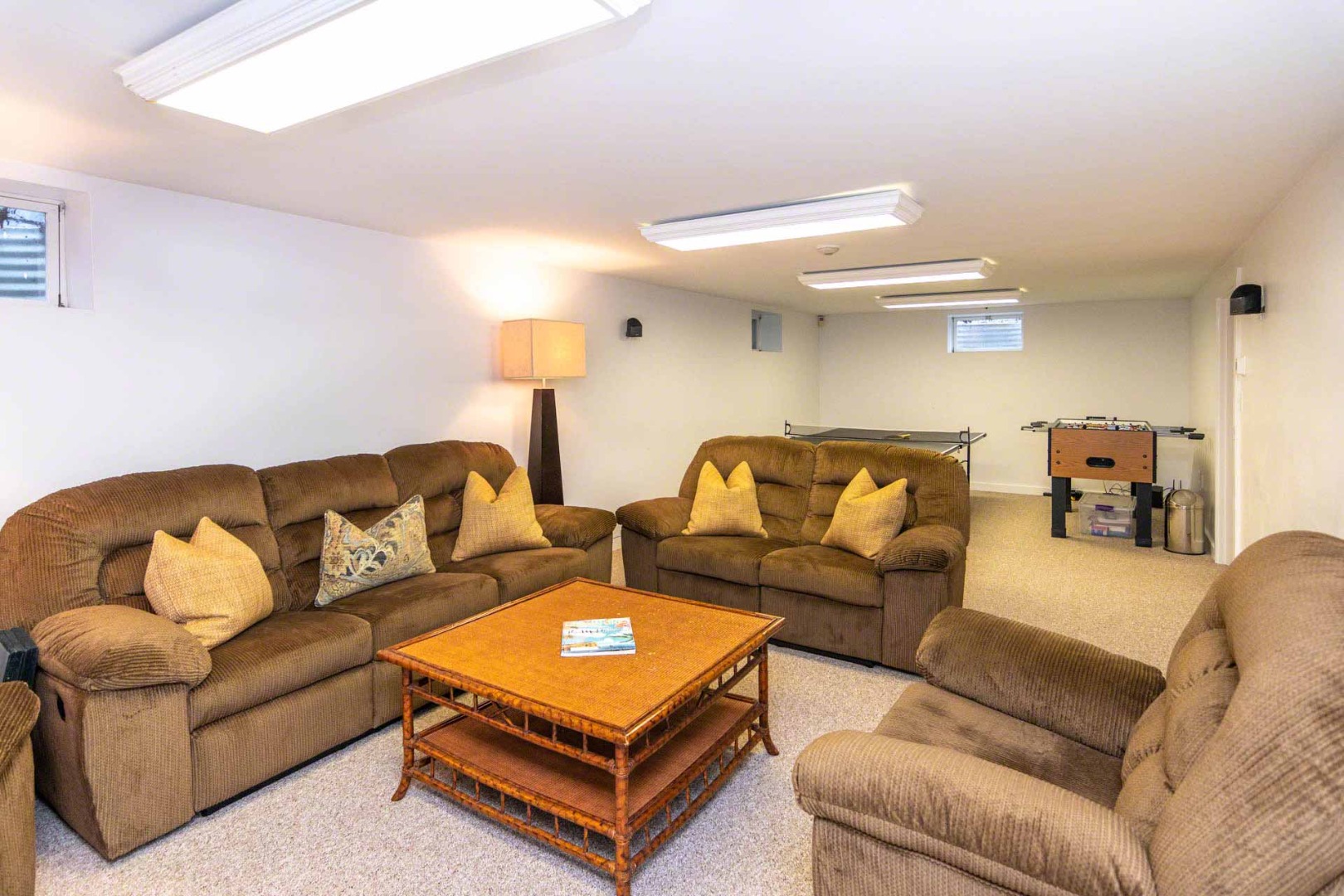 22 Edgartown Bay Road Edgartown, MA 02539 - Photo 42 of 55 a living room with furniture a rug and a lamp