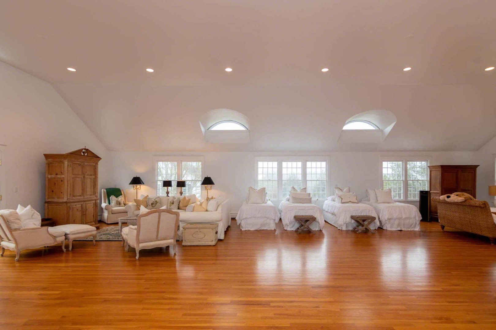 22 Edgartown Bay Road Edgartown, MA 02539 - Photo 47 of 55 a living room with lots of furniture and a wooden floor
