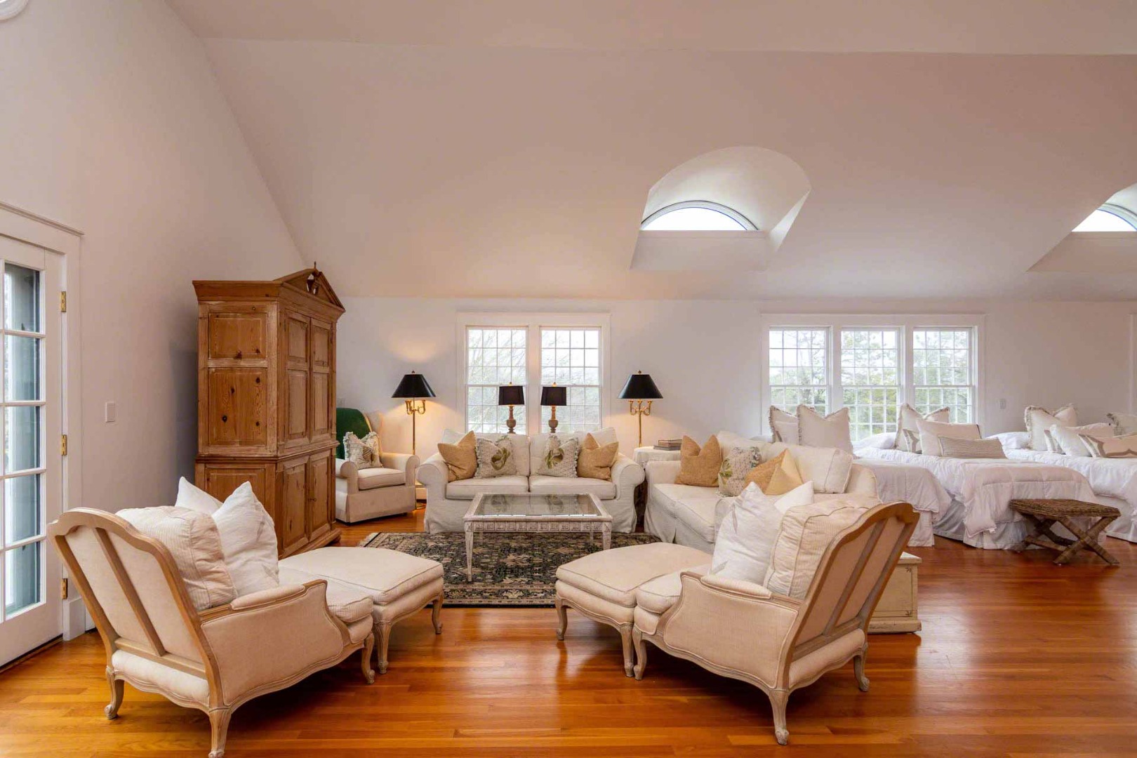 22 Edgartown Bay Road Edgartown, MA 02539 - Photo 48 of 55 a living room with furniture wooden floor and a large window