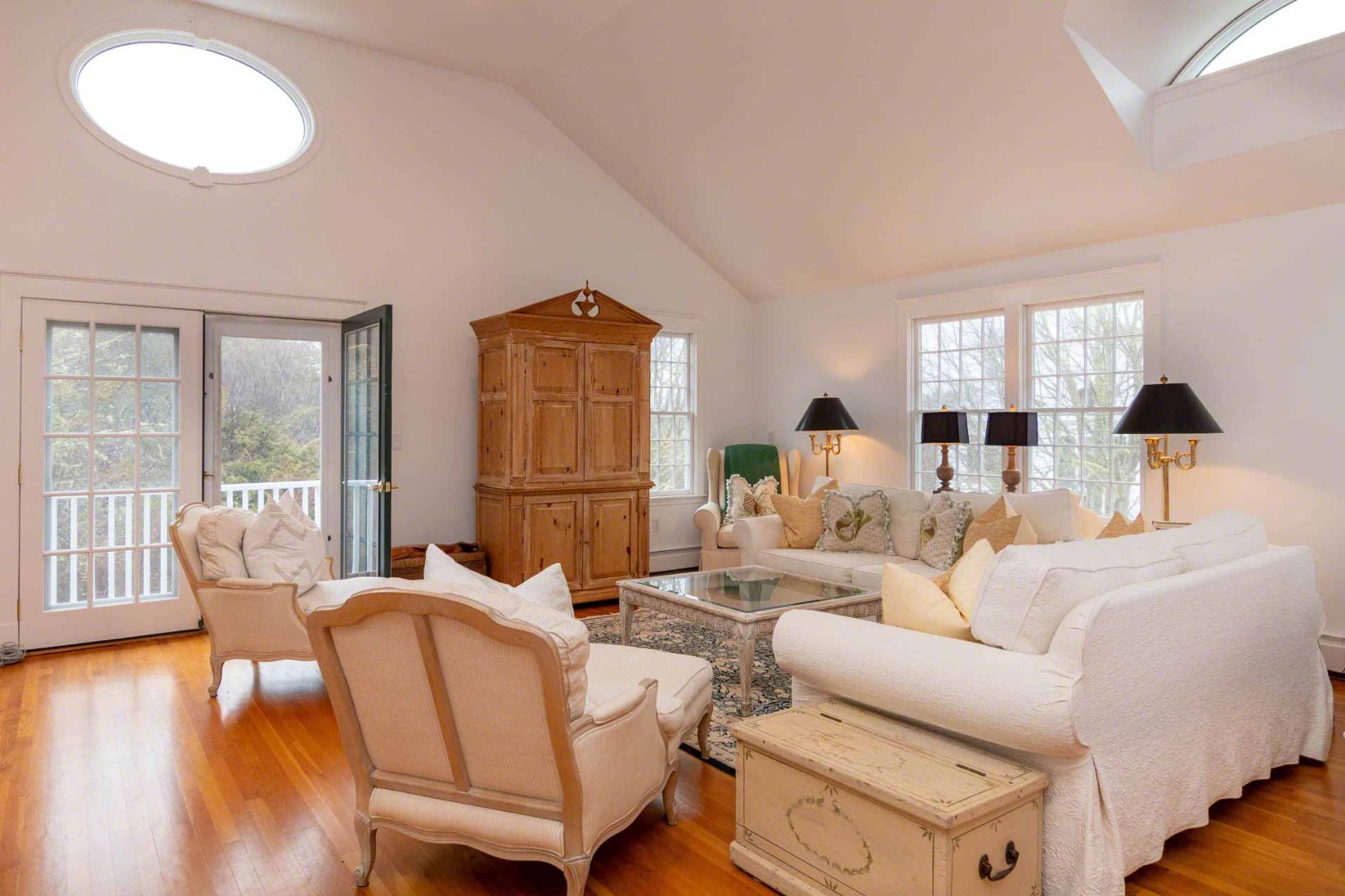 22 Edgartown Bay Road Edgartown, MA 02539 - Photo 49 of 55 a living room with furniture and a large window