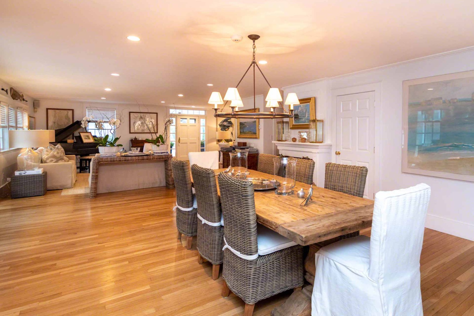22 Edgartown Bay Road Edgartown, MA 02539 - Photo 10 of 55 a living room with fireplace furniture and a chandelier