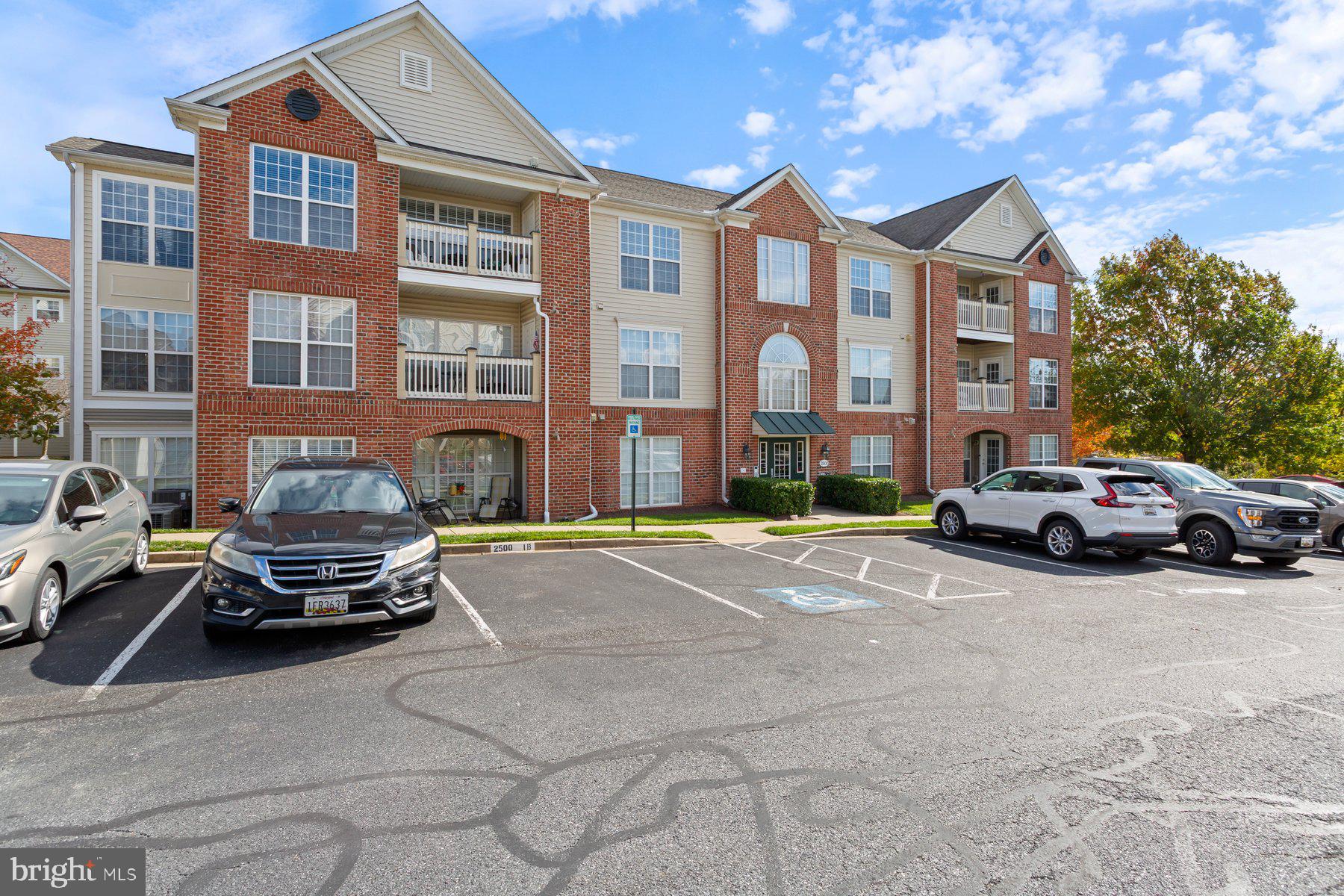 2500 Hemingway Drive, Unit 33D Frederick, MD 21702 - Photo 1 of 29 a car parked in front of a brick house