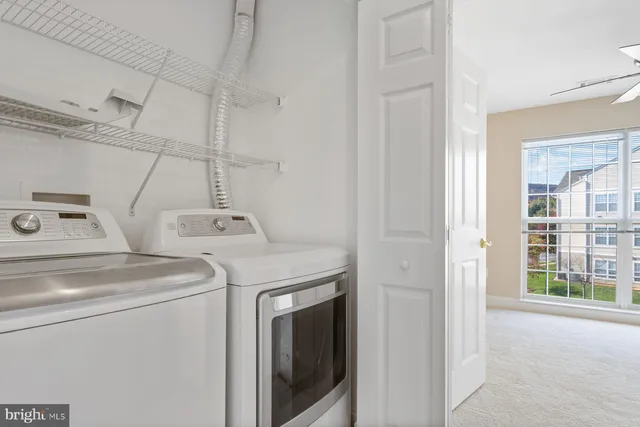 a view of a balcony with chairs