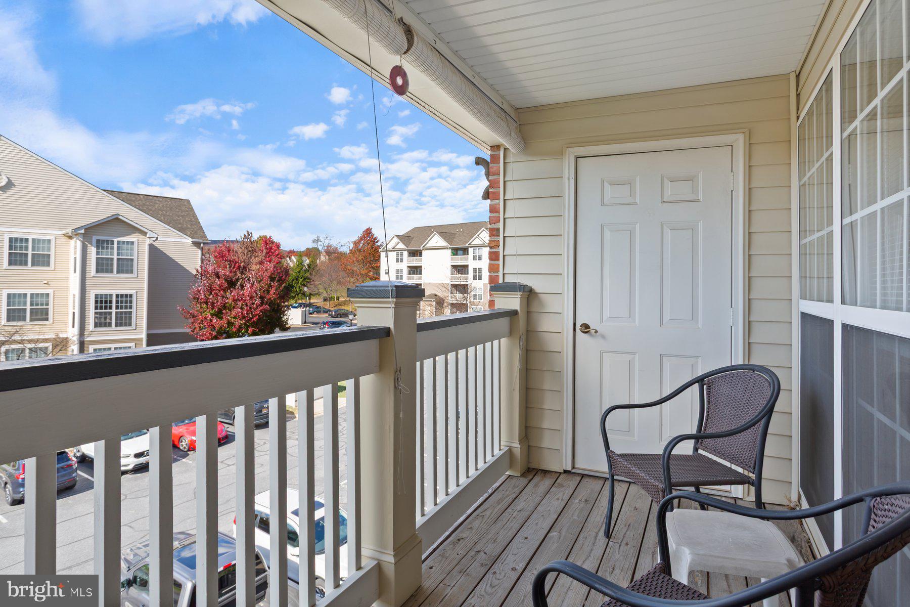 2500 Hemingway Drive, Unit 33D Frederick, MD 21702 - Photo 29 of 29 a view of a balcony with chairs