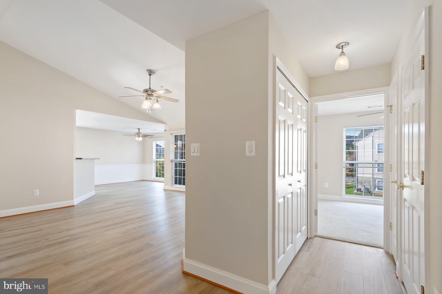 2500 Hemingway Drive, Unit 33D Frederick, MD 21702 - Photo 4 of 29 a view of a hallway with wooden floor and closet