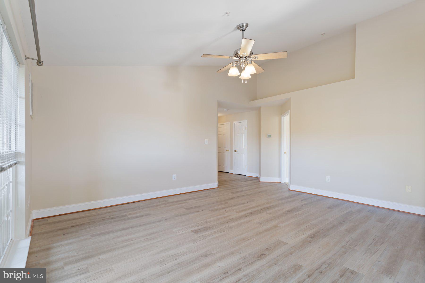 2500 Hemingway Drive, Unit 33D Frederick, MD 21702 - Photo 7 of 29 a view of an empty room with wooden floor