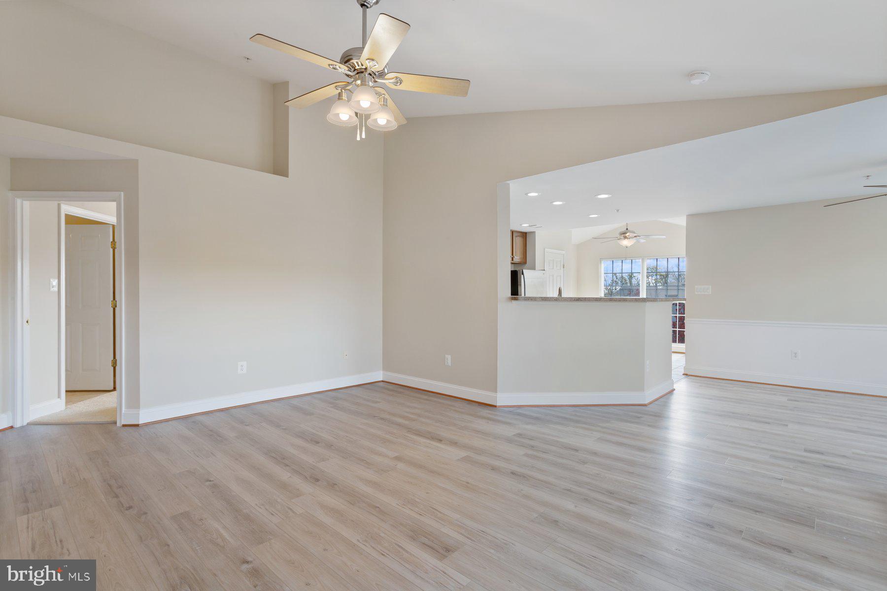 2500 Hemingway Drive, Unit 33D Frederick, MD 21702 - Photo 8 of 29 a view of a kitchen with a dishwasher cabinets and wooden floor