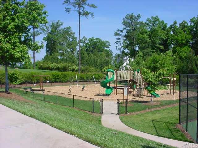 745 Seastone Street Raleigh, NC 27603 - Photo 3 of 10 Tot lot located next to tennis court and swimming pool.