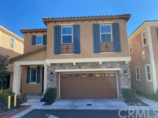 a front view of building with yard