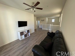 46326 Cask Lane Temecula, CA 92592 - Photo 16 of 22 a living room with furniture and a flat screen tv