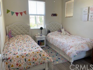 46326 Cask Lane Temecula, CA 92592 - Photo 20 of 22 a bedroom with a bed and a window