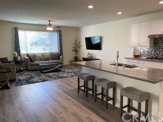 46326 Cask Lane Temecula, CA 92592 - Photo 5 of 22 a living room with furniture and a flat screen tv