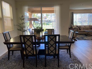 46326 Cask Lane Temecula, CA 92592 - Photo 7 of 22 a view of a dining room with furniture window and outside view