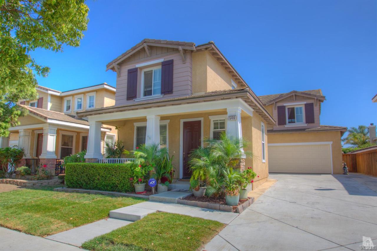 546 Morado Place Oxnard, CA 93030 - Photo 1 of 41 a front view of a house with a garden