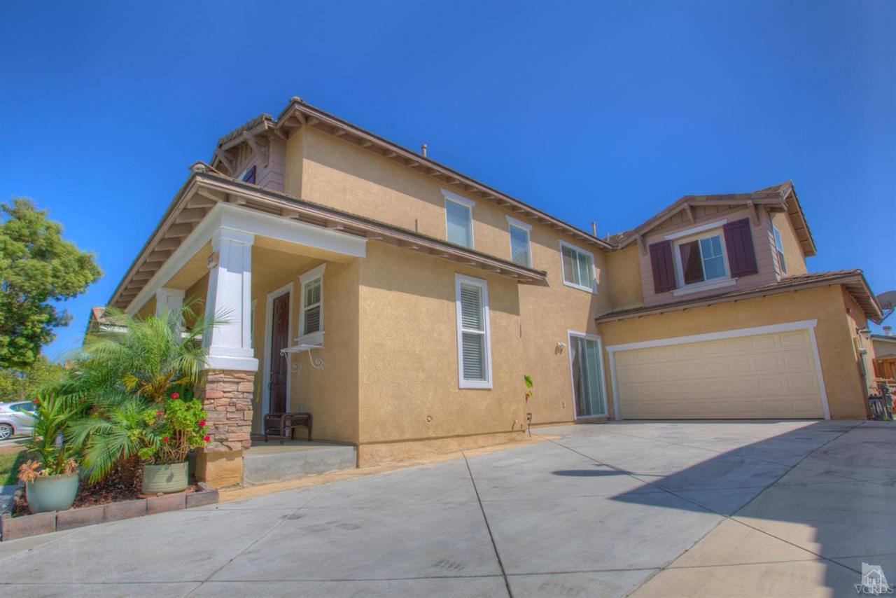 546 Morado Place Oxnard, CA 93030 - Photo 2 of 41 a front view of a house with a yard