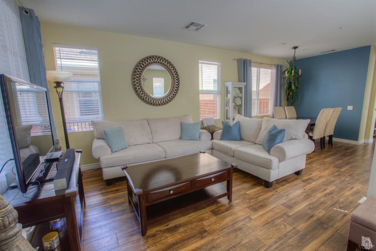 546 Morado Place Oxnard, CA 93030 - Photo 15 of 41 a living room with furniture and a wooden floor