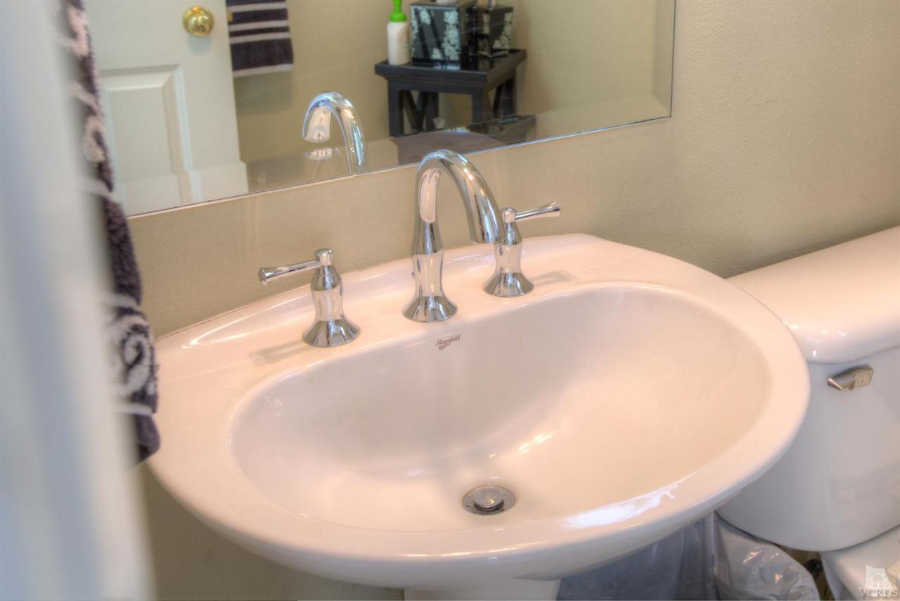 546 Morado Place Oxnard, CA 93030 - Photo 17 of 41 a bathroom with a sink