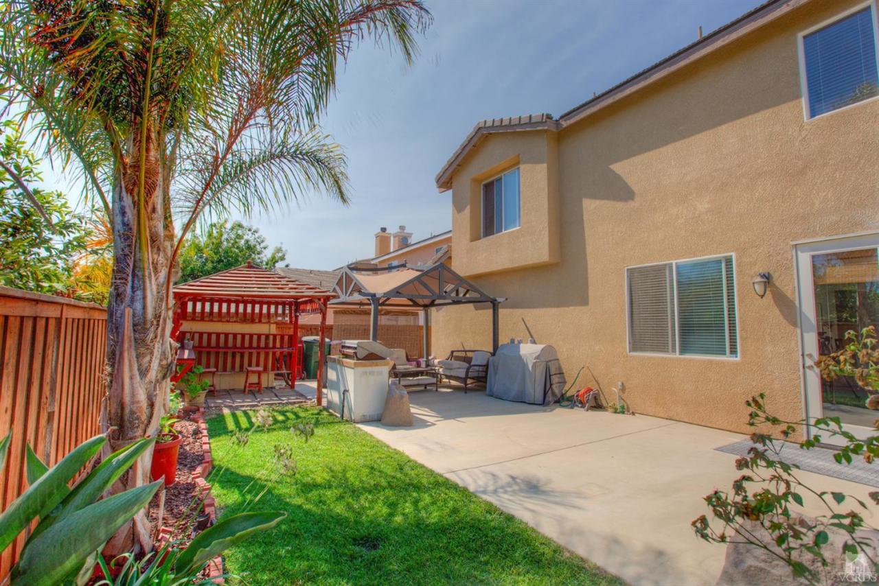 546 Morado Place Oxnard, CA 93030 - Photo 29 of 41 a front view of a house with garden