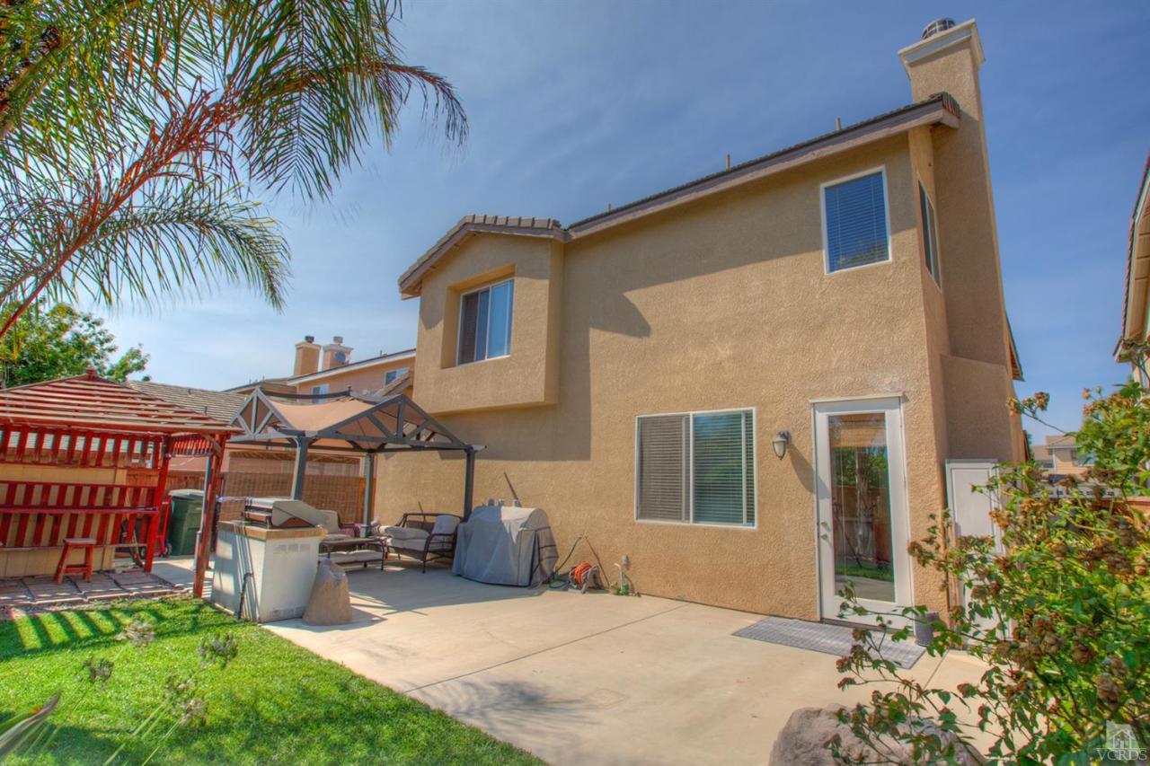 546 Morado Place Oxnard, CA 93030 - Photo 37 of 41 a front view of a house with porch and furniture