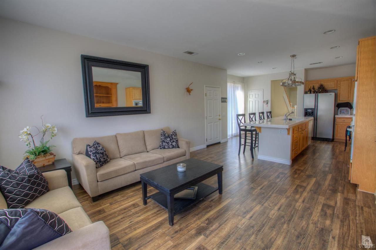 546 Morado Place Oxnard, CA 93030 - Photo 9 of 41 a living room with furniture and a wooden floor