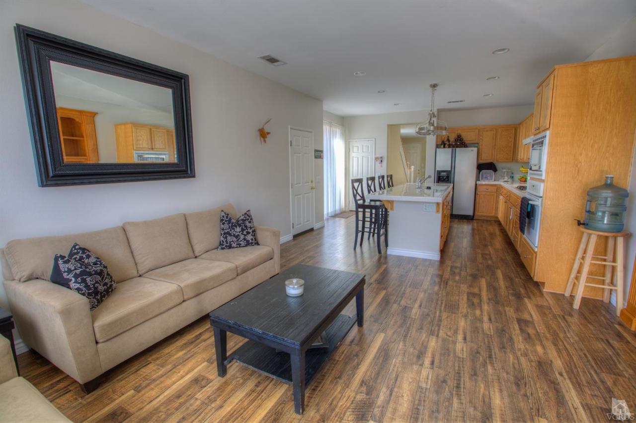 546 Morado Place Oxnard, CA 93030 - Photo 10 of 41 a living room with furniture and a wooden floor