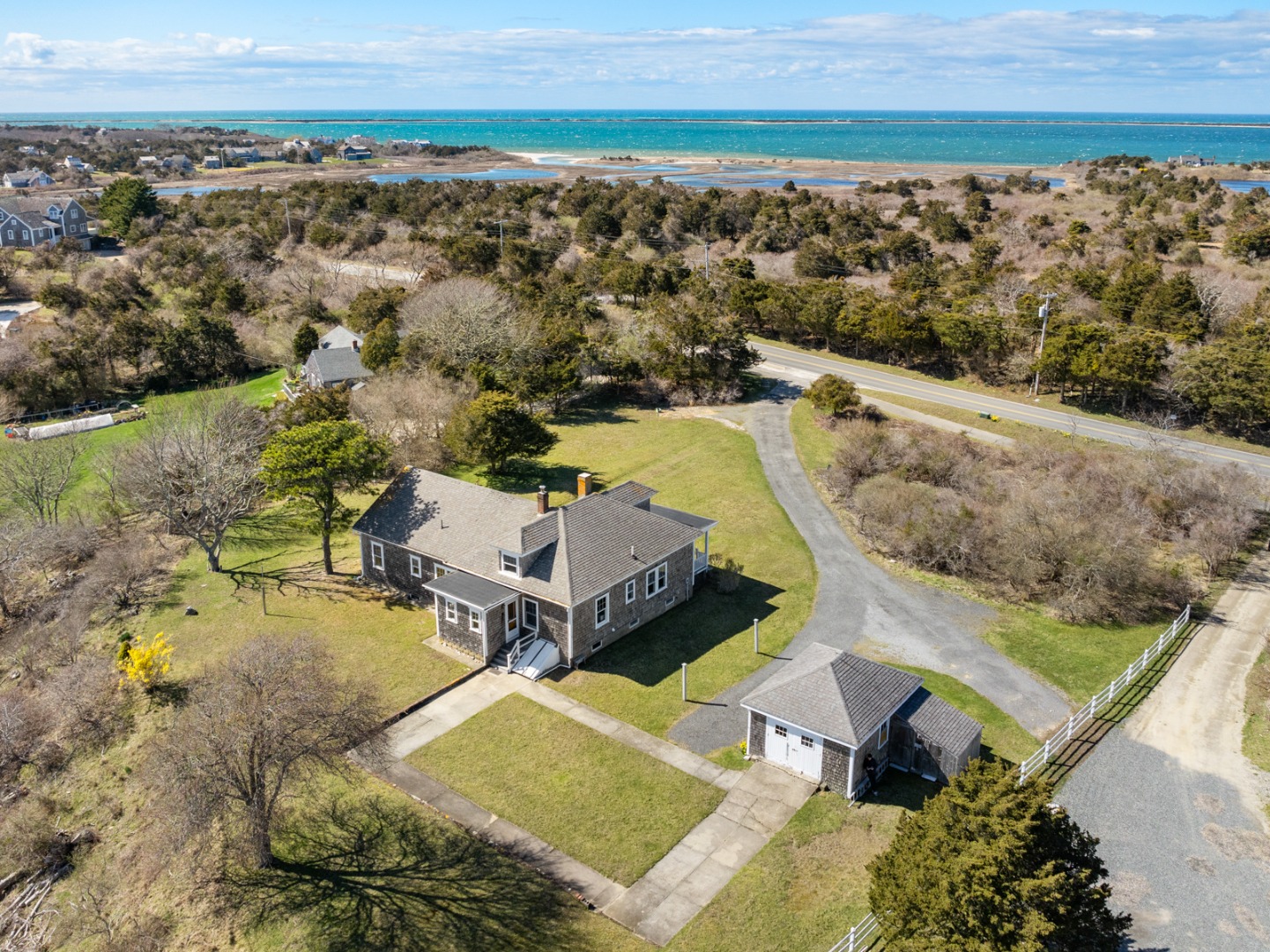 181 Polpis Road Nantucket, MA 02554 - Photo 6 of 22 an aerial view of residential houses with outdoor space