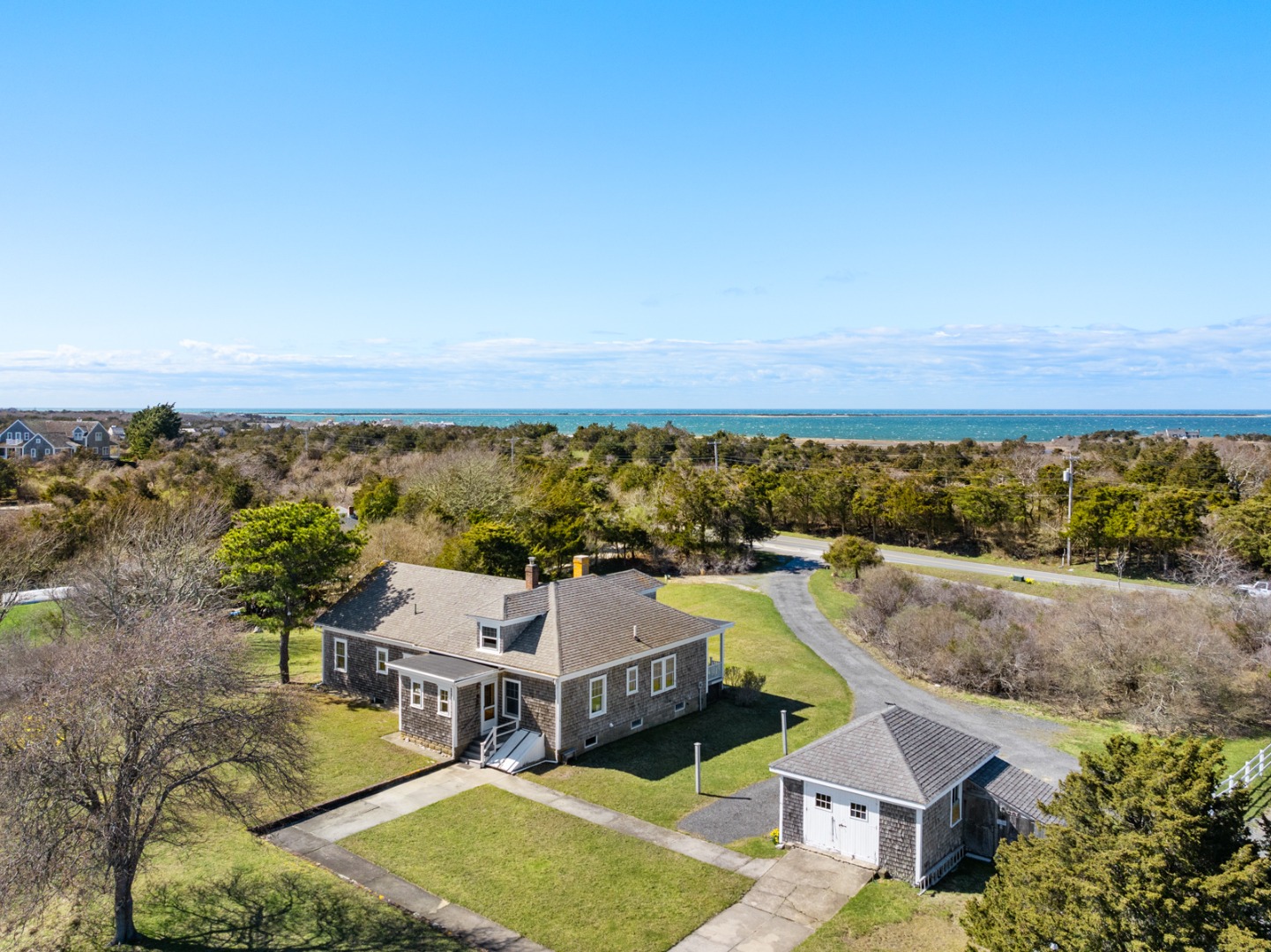 181 Polpis Road Nantucket, MA 02554 - Photo 7 of 22 an aerial view of a house with a yard