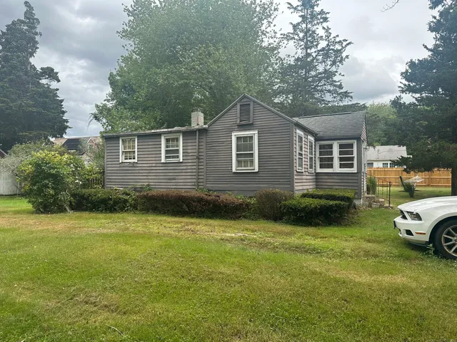 a house view with a garden space