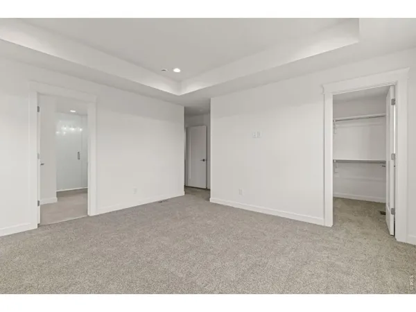 a bathroom with a bathtub sink a mirror and shower