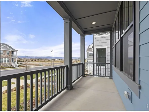 a view of city from a balcony