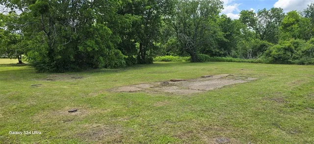 a view of outdoor space with deck and yard
