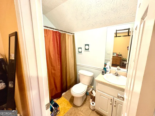 a view of a patio with swimming pool