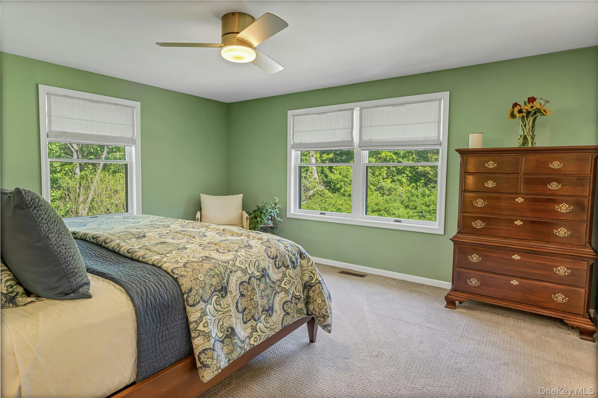 340 Osceola Road Jefferson Valley, NY 10535 - Photo 20 of 48 a bedroom with a bed and a window